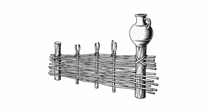 Woven wooden fence with a jug atop a post, a rustic scene