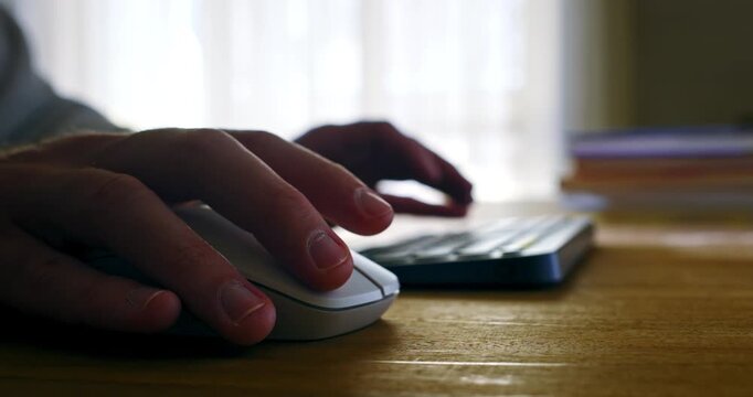 Slow Motion Of Hands Using Computer Mouse And Keyboard With Neon Blue Lighting, Modern Technology Workspace And Digital Productivity Concept