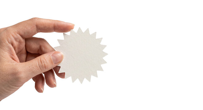 Minimalist white starburst paper tag held by hand, blank sunburst price sticker for retail marketing, clean paper cutout for promotional sales isolated PNG with Transparent Background