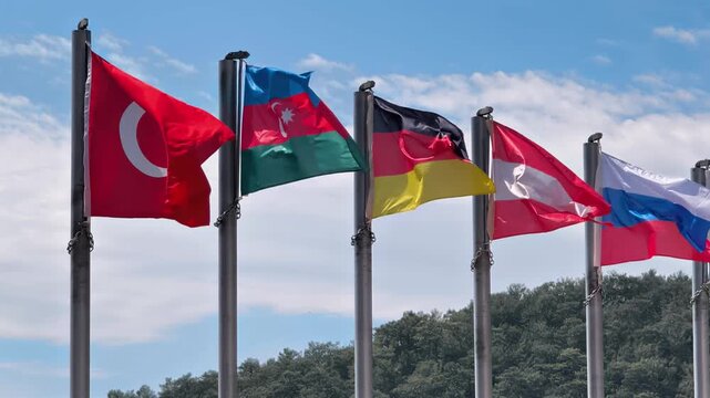 Flags of Turkey, Azerbaijan, Germany, Austria and Russia Waving in the Wind