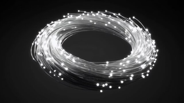 Coiled string of fairy lights on black background.