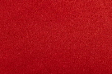 Fototapeta premium Vibrant Red Paper Texture Background,Macro,Close-up high-resolution macro shot of a bright red textured paper surface, perfect for festive holiday backgrounds, creative design elements, or minimalist 