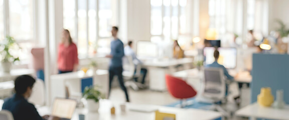 A modern office environment with employees working at desks and collaborating, featuring open spaces, plants, and contemporary furniture. © Vhagar