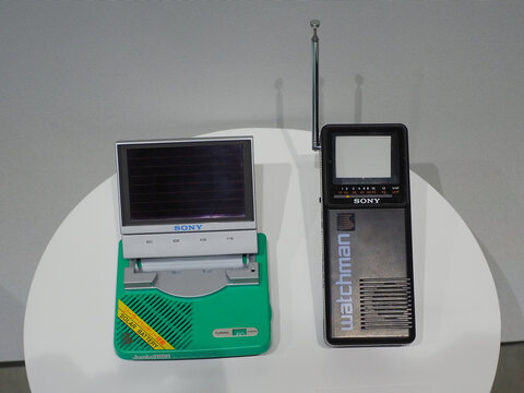 TOKYO, JAPAN - May 2, 2026: A Sony Watchman portable television and a JumboTRON solar-powered radio on display at a Sony exhibition.