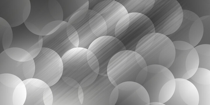 Abstract grayscale background with circular shapes and light rays