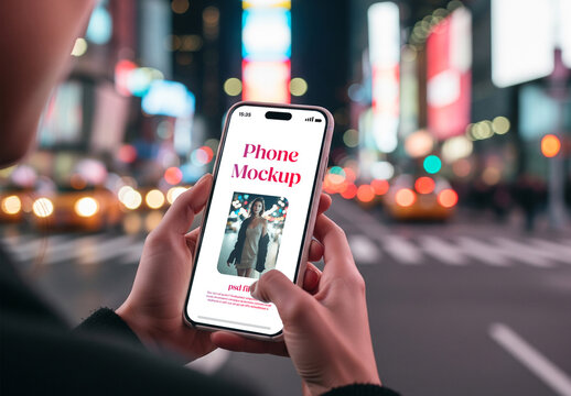 Close up of a smartphone at night in city scene &ndash; mockup