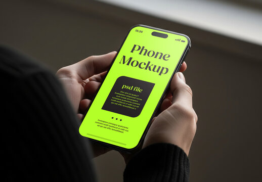 Close up of a smartphone held by two hands