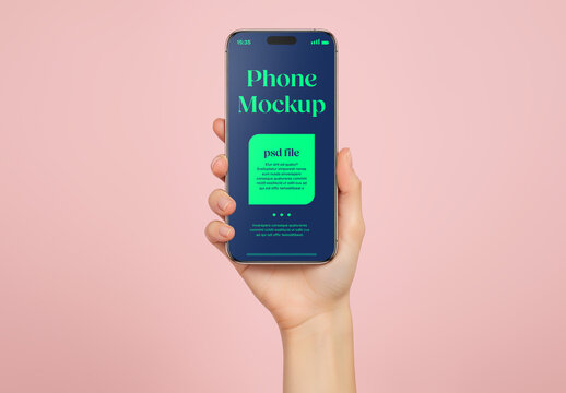 A woman holding a smartphone on pink background