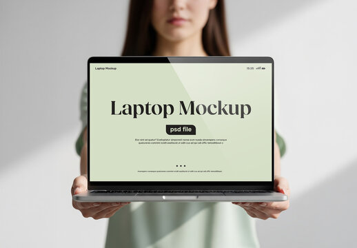 Woman showing a laptop screen for a mockup