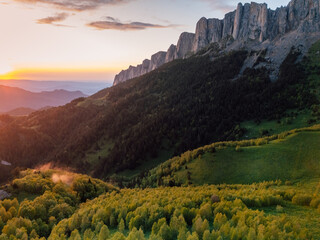 Obraz premium Above drone view of national park Bolshoy Tkhach mountain in Caucasus with sunset sunlight