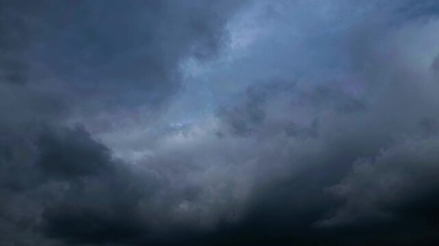 Dramatic Storm Clouds Opening to Blue Sky Timelapse