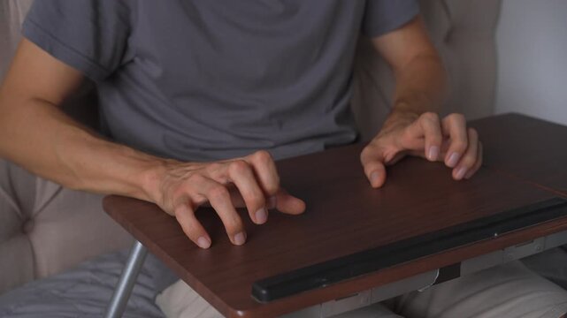 Man tapping fingernails on a table, high quality uncompressed audio recording. Sharp rhythmic clicking sound and subtle gesture. Concentration, impatience and everyday human behavior concept.