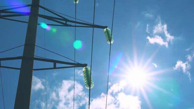Electric Pole with Voltage, Electricity, Electric Grid, electrical energy for AI, cryptocurrency mining, Power Grid, Equipment and Beautiful Time Lapse of Clouds Sun and Pure Blue Sky.