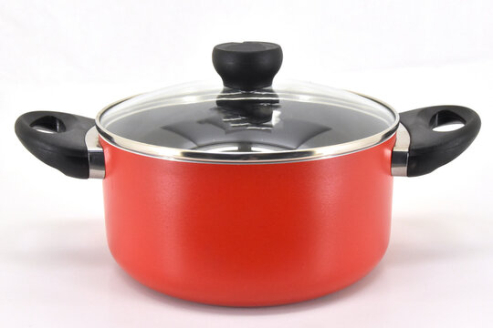 Durable red cooking pot isolated on white, ideal for boiling and cooking large meals with induction compatible nonstick surface