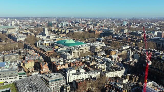 Bird's eye panorama of London showing British Museum in Bloomsbury and sprawling urban landscape of the city under a clear sky on a sunny winter morning