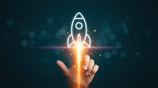 A human hand reaches upward to touch a glowing white neon rocket ship icon that is emitting a bright orange fiery exhaust trail against a dark blue background with soft circular bokeh light effects.