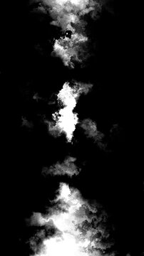 Black and white smoke texture with bright fog plume, dark negative space, and cloudy abstract edges. for video masks, title reveals, grunge overlays, cinematic transitions, and atmospheric effects.