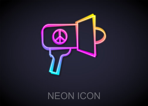 Glowing neon line Megaphone icon isolated on black background. Speaker sign. Vector