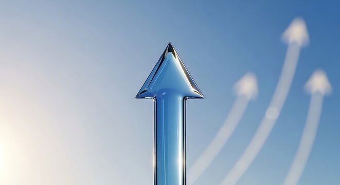 Upward pointing arrow against a clear sky background