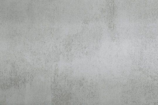 Textured concrete surface with subtle variations in light