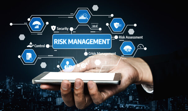 A professional hand holds a smartphone showcasing the risk management concept with data visuals and icons, set against a dark city backdrop. Tessel