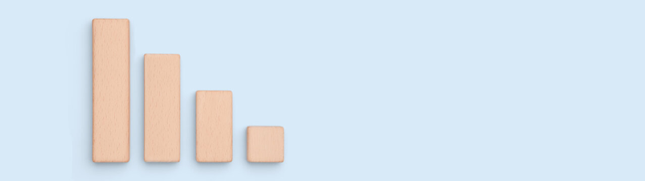 Cost reduction concept with decreasing wooden block chart