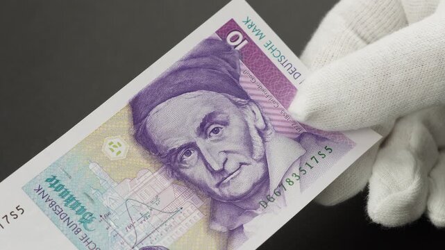 10 Deutsche Mark Banknote in hands, Germany, 1989&ndash;1999 hands-on overview of German paper money, footage