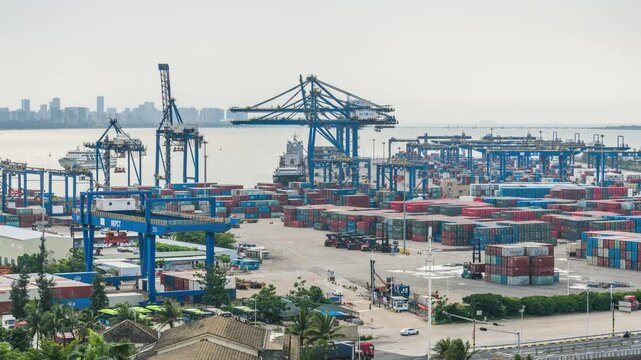 Time-lapse of container terminal at Xiuying Port, Haikou, Hainan Free Trade Port, busy seaport shipping and cargo logistics scene