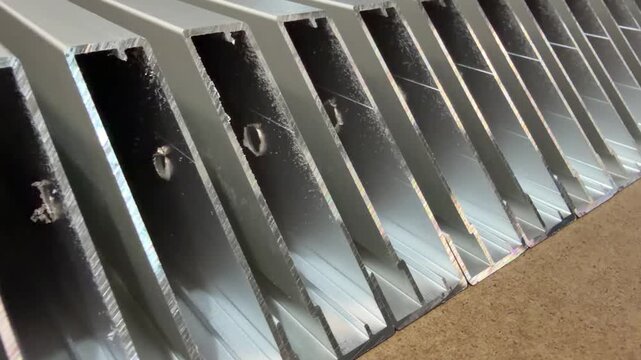 Modern materials close-up: aluminium profiles with a sleek design, perfect for website content about construction materials.