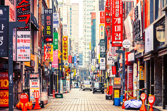 South Korea, Busan - March 30, 2026: A large shopping street with colorful advertising in the city center