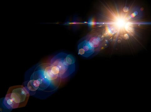 Vibrant light beam with colorful lens flares on a dark background with bright starburst