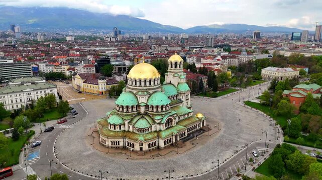 Aerial view of the majestic Alexander Nevsky Cathedral in Sofia. Stunning architecture and vibrant colors. Breathtaking drone view of the cityscape and the cathedral. Bulgaria