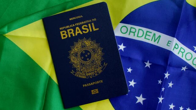 Brazilian Passport on the Flag: A symbol of national identity, the passport rests upon the vibrant flag of Brazil, evoking citizenship and pride.