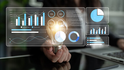 A light bulb symbolizing innovation stands among various digital graphs and analytics, illustrating the intersection of creativity and data in a modern business environment. Gantry © InfiniteFlow