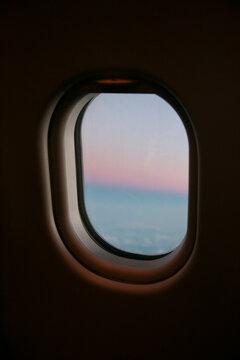 View of sunset from airplane window