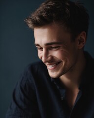 Obraz premium Happy young man portrait smiling, positive emotion