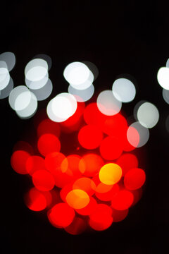 Abstract red and white bokeh lights backround with cops space