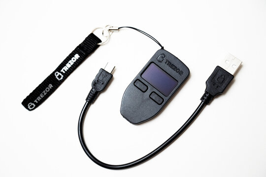 Odesa, Ukraine - April 7, 2026: Black Trezor One hardware crypto wallet isolated on white background