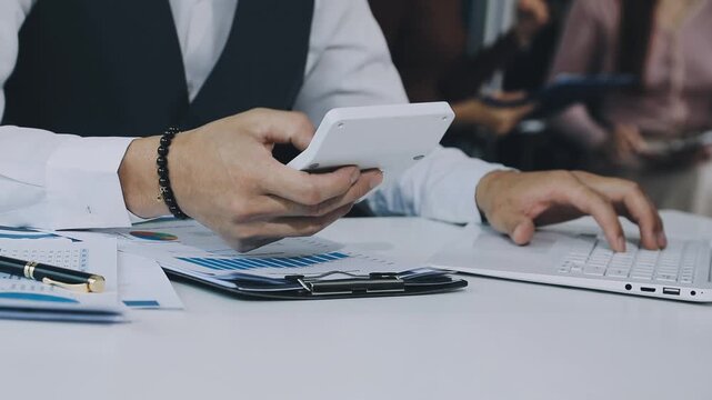 Businessman and Certified Public Accountant (CPA) auditor providing accounting and auditing services in the same company and stock market chart data and anti bribery of accounting