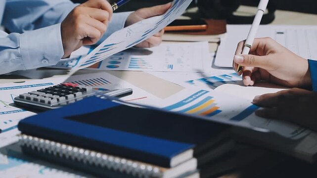 Businessman and Certified Public Accountant (CPA) auditor providing accounting and auditing services in the same company and stock market chart data and anti bribery of accounting