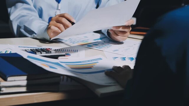 Businessman and Certified Public Accountant (CPA) auditor providing accounting and auditing services in the same company and stock market chart data and anti bribery of accounting