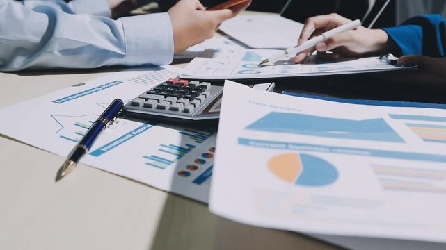 Businessman and Certified Public Accountant (CPA) auditor providing accounting and auditing services in the same company and stock market chart data and anti bribery of accounting