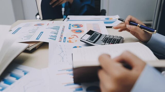 Businessman and Certified Public Accountant (CPA) auditor providing accounting and auditing services in the same company and stock market chart data and anti bribery of accounting