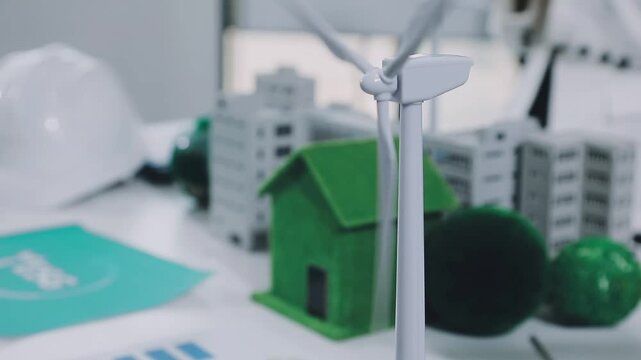 Group of alternative energy engineers discussing a project with a worker during a meeting in the office. Green energy development concept