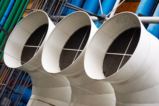 Detailed view of three white ventilation intake ducts on the high-tech exterior of the Centre Pompidou, Paris, France, Europe.