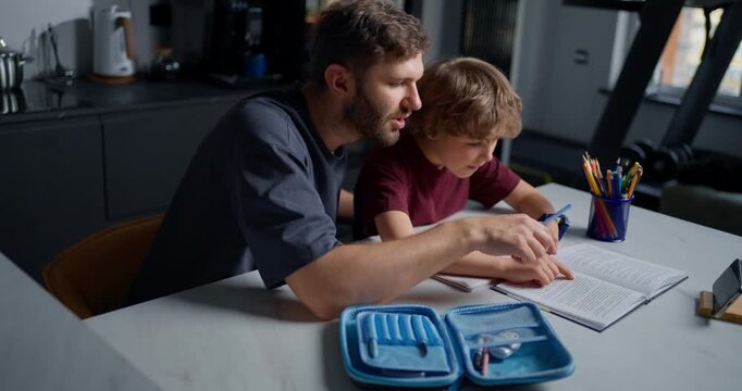 White Father Correcting Son Writing Technique Close Demonstration Steady Hands Patient Tone