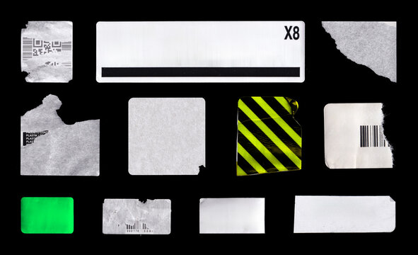 Blank Paper Stickers and Torn Labels Set on Black. Blank paper labels, price tags with a crumpled effect, torn barcode stickers, peeled edges, or partially torn. Photo High-quality