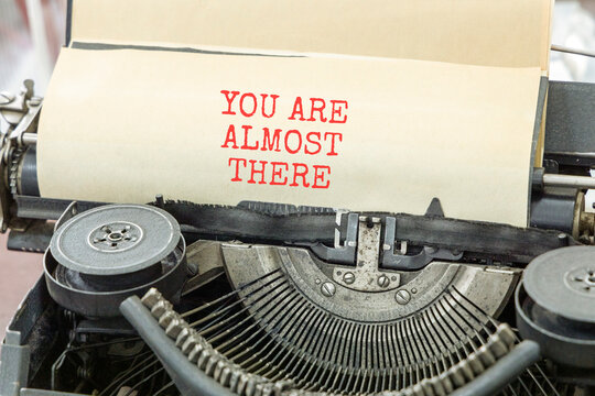 You are almost there words symbol. Concept words You are almost there typed on old retro typewriter. Beautiful white background. Business You are almost there motivational support concept. Copy space.