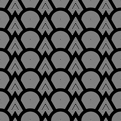 Fish scale wallpaper. Asian traditional ornament with repeated scallops. Repeated white triangular and circular shapes on black background. Seamless surface pattern design with scales. Squama motif. © funkyplayer