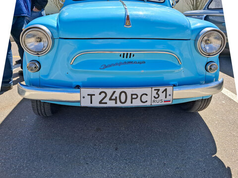 VORONEZH, Russia - April 25, 2026.Restored blue Soviet ZAZ Zaporozhets microcar at retro vehicle festival in spring sun